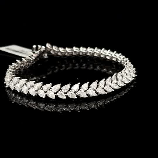 Pear Diamond Chevron Tennis Bracelet in White Gold