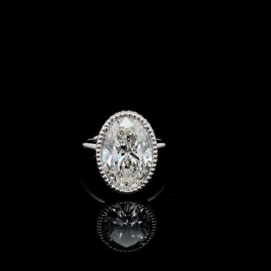 Oval Diamond Solitaire Ring with Milgrain Bezel in White Gold