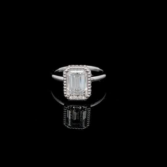 Emerald Cut Diamond Solitaire Ring in White Gold