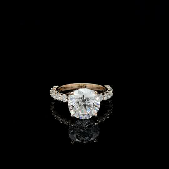 Round Diamond Solitaire Ring with Accented Yellow Gold Band