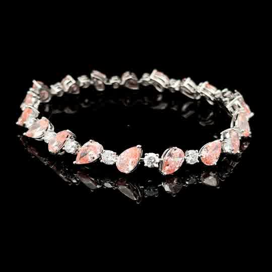 Pear-Cut Fancy Pink Diamond Tennis Bracelet in White Gold