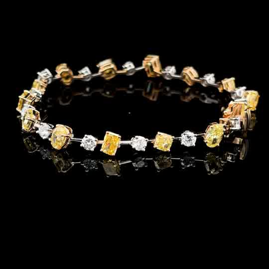 Alternating Fancy Vivid Yellow Diamond White Gold Tennis Bracelet
