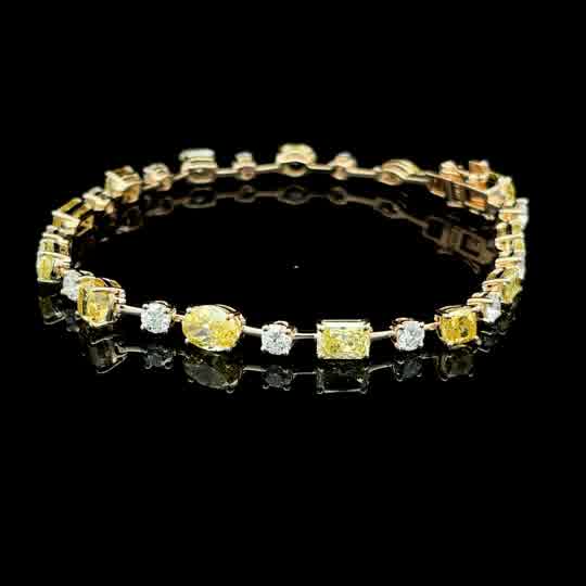 Fancy Vivid Yellow & Colorless Diamond Tennis Bracelet — Yellow Gold