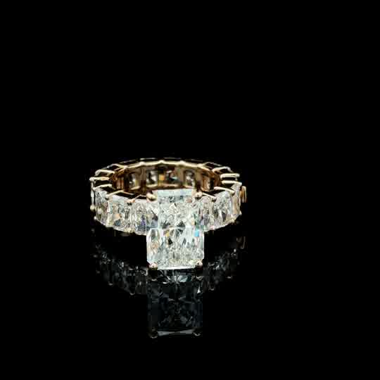 Radiant Cut Diamond Eternity Ring in Yellow Gold