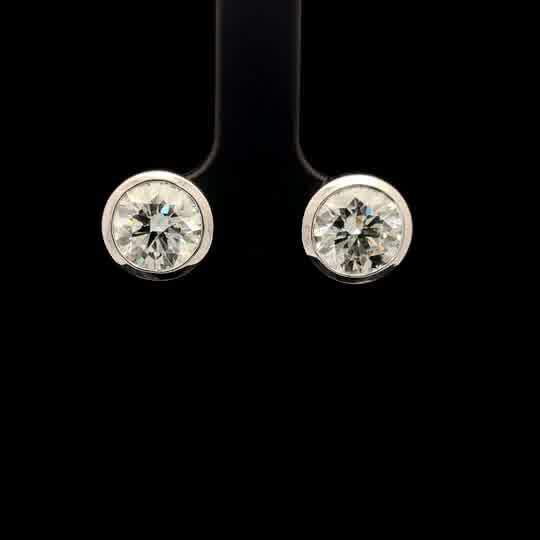Round Diamond Bezel Set Stud Earrings in White Gold