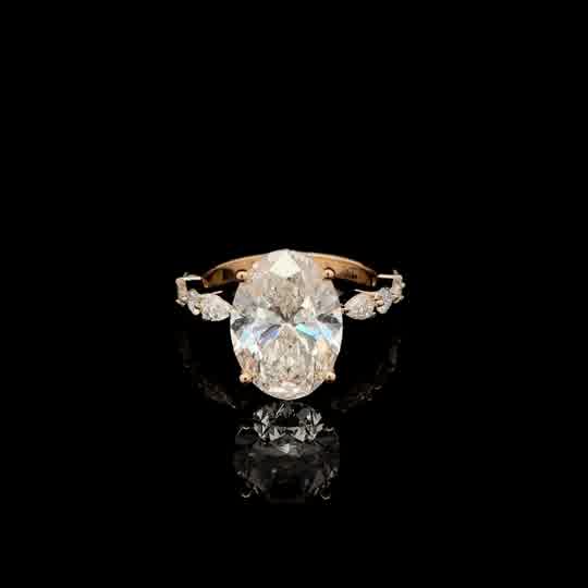 Oval Cut Diamond Multi-Stone Ring in Yellow Gold