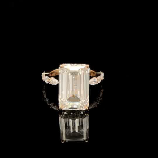 Emerald Cut Diamond Solitaire Ring in Yellow Gold