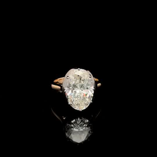 Oval Cut Diamond Solitaire two tone Ring in White/Yellow Gold