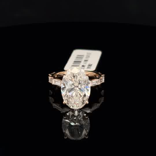 Oval Cut Diamond Yellow Gold Ring with Baguette Accents