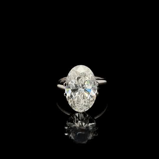 Oval Cut Diamond Solitaire Ring in White Gold