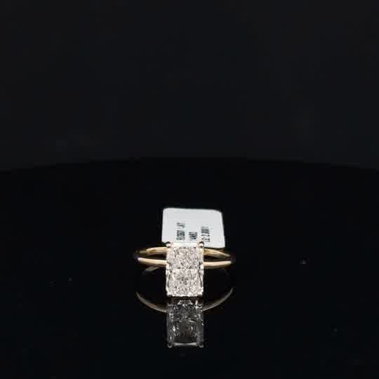 Elongated Diamond Solitaire Ring in Yellow Gold