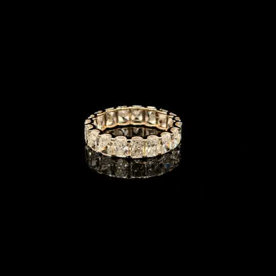 Radiant Cut Diamond Eternity Ring in Yellow Gold