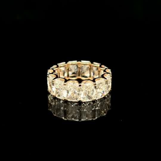 Radiant Cut Diamond Eternity Ring in Yellow Gold