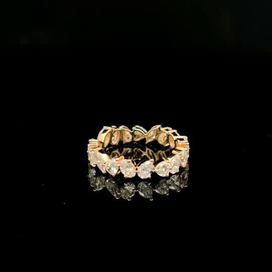 Pear Cut Diamond Eternity Ring in Yellow Gold