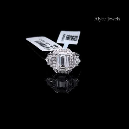 Emerald Cut Diamond Halo Three-Stone Ring in White Gold